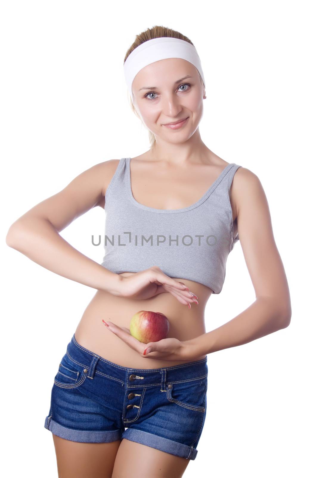 Perfect Slim Woman Body and apple on white background. Diet Concept