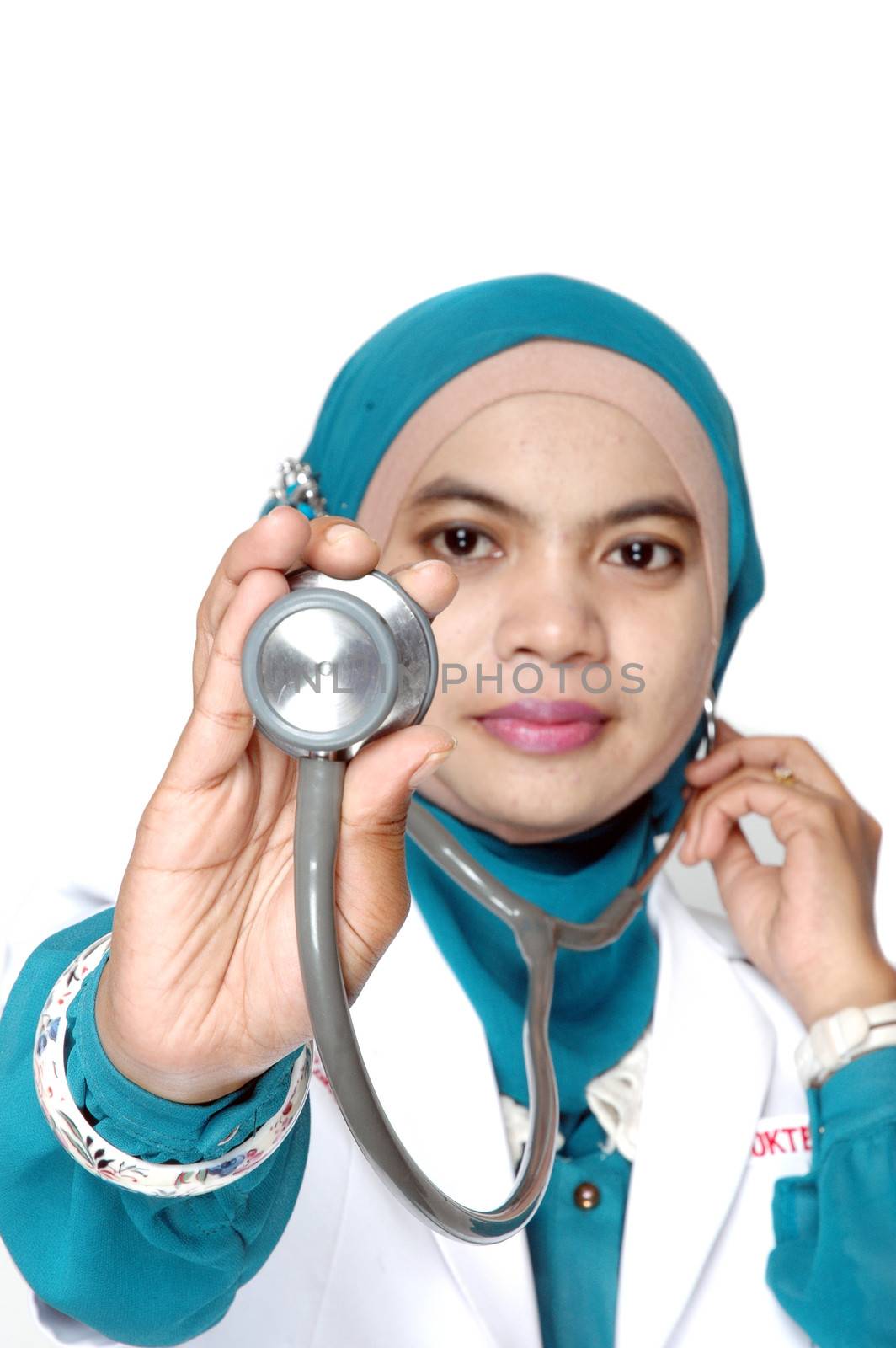 Asian young woman doctor holding a stethoscope on white background