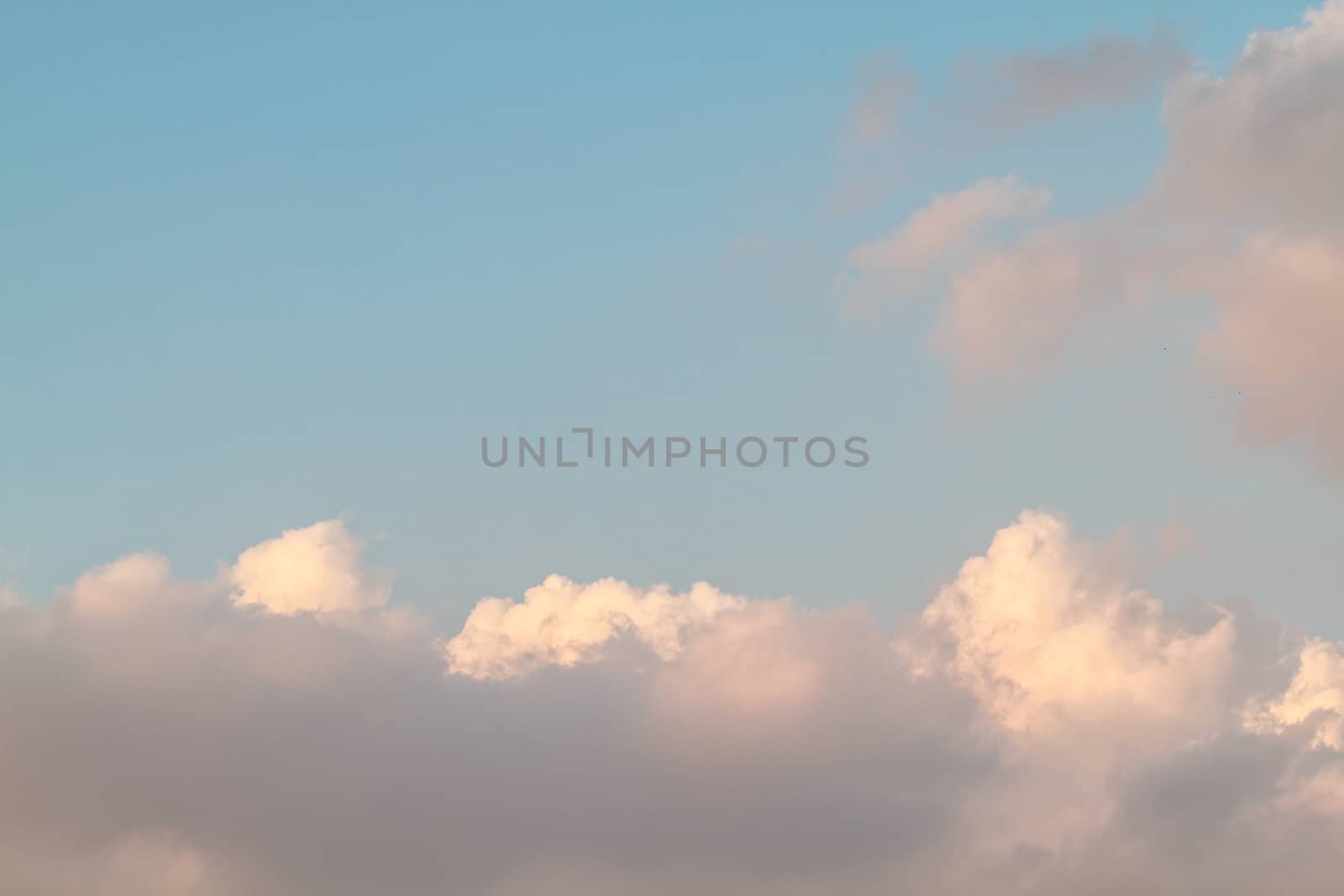 Blue sky with a white clouds for background