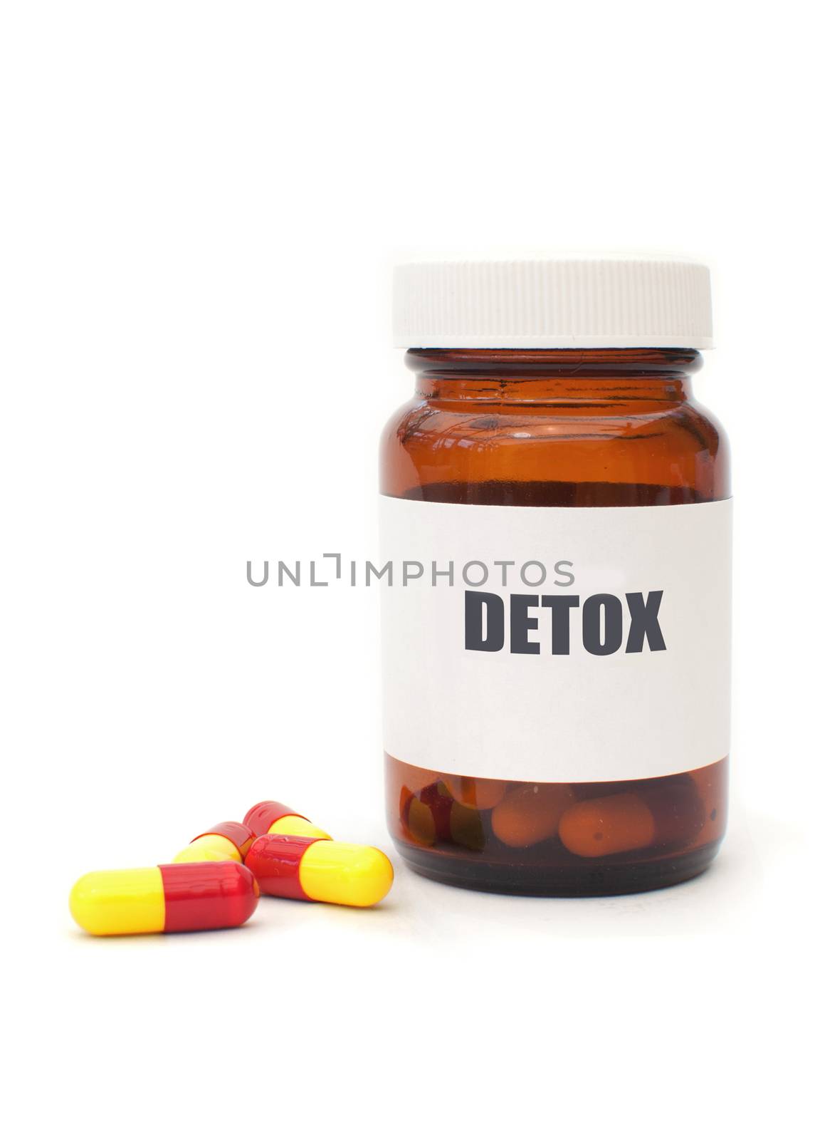 Jar of detox pills over a white background