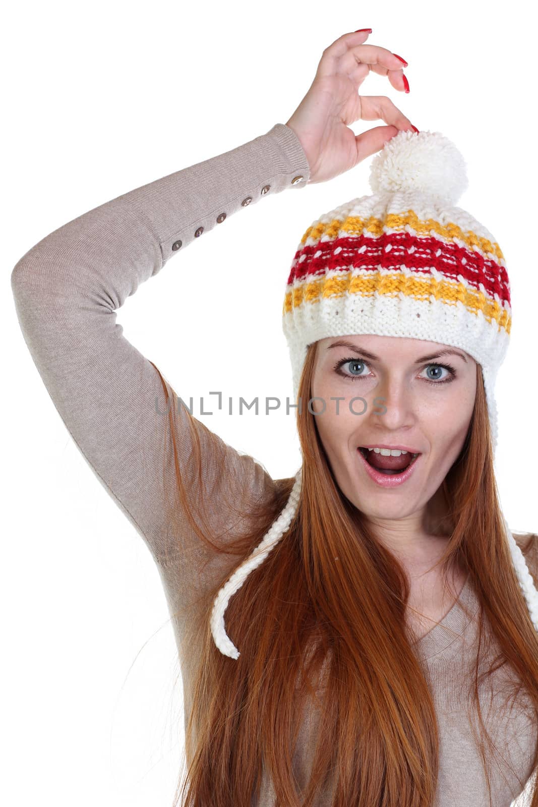 young happy woman in a knitted hat