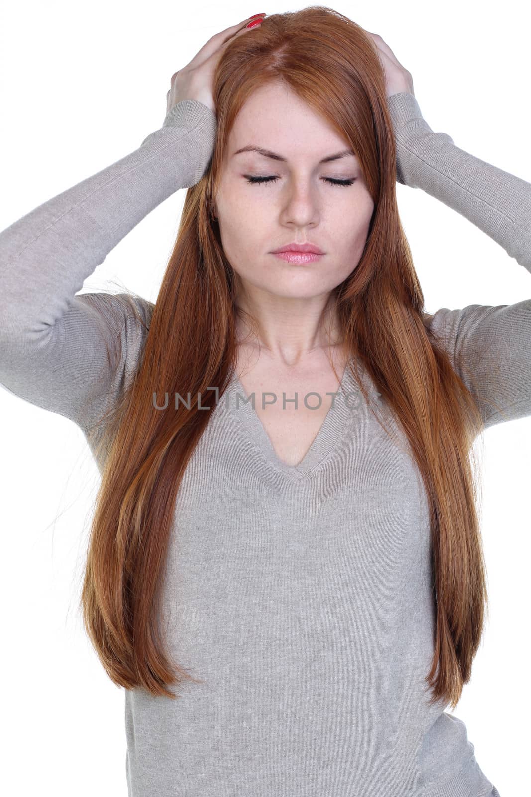 Unhappy young woman with bad headache on white background