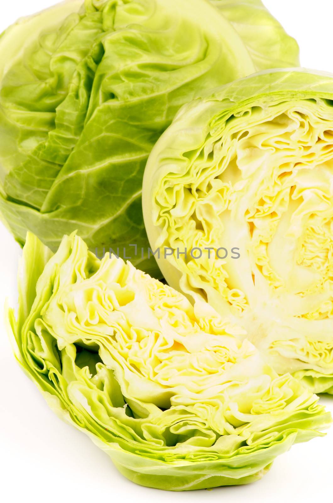 Heap of Fresh Raw Cabbage Full Body and Halves closeup on white background