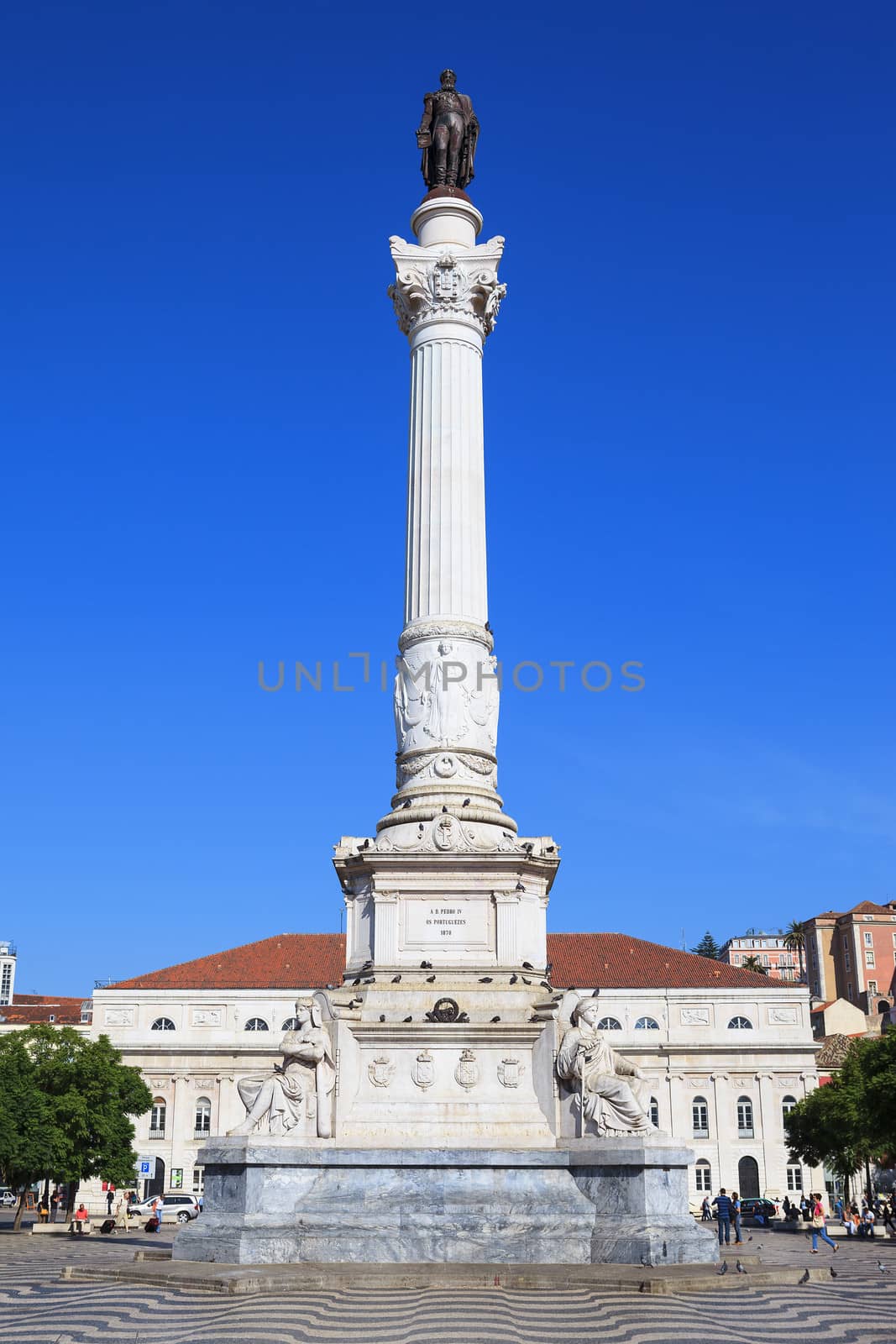Famous Rossio Square in Lisbon, Portugal, with Pedro King statue 
