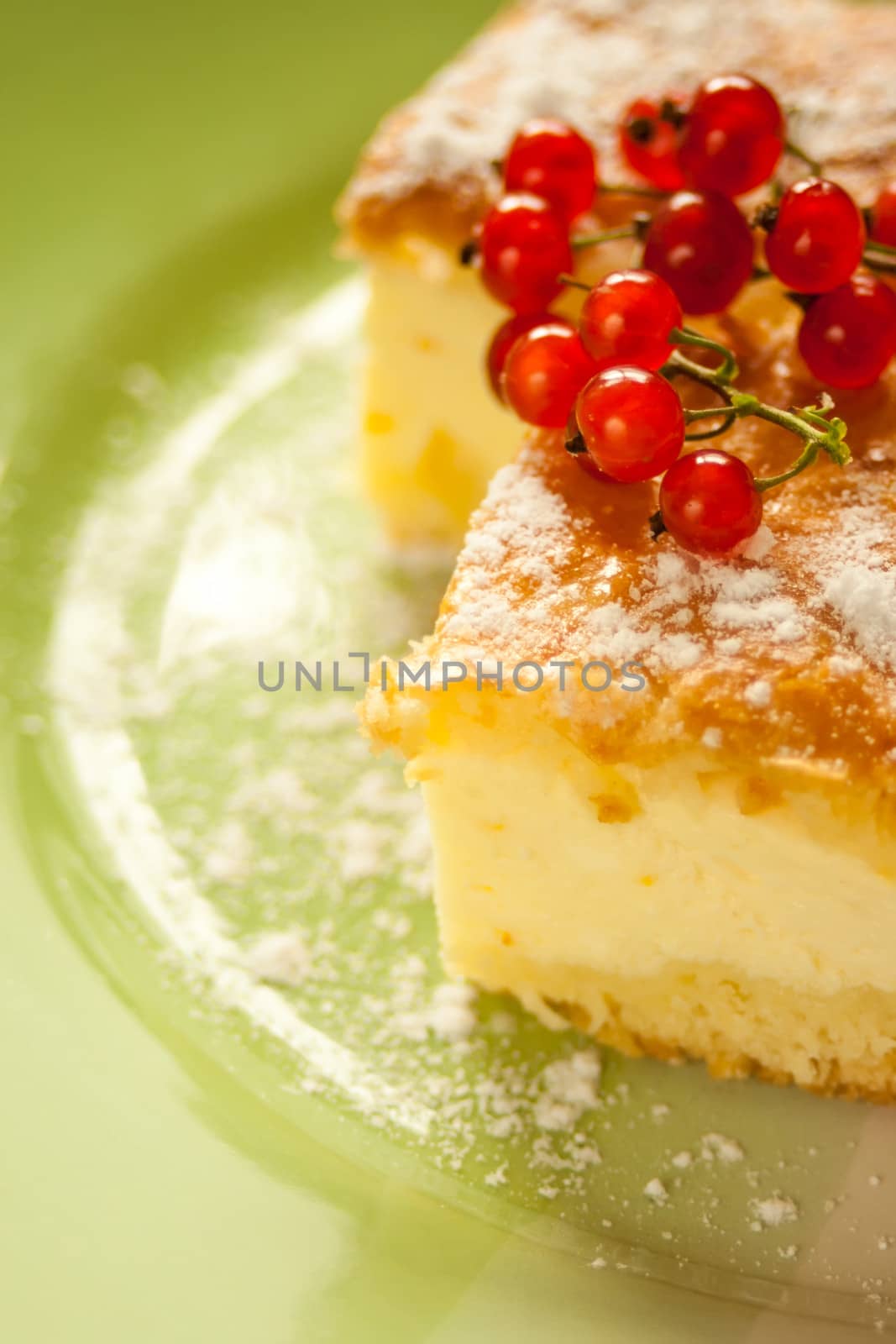 Home made Cheese cake with fruits on a plate.