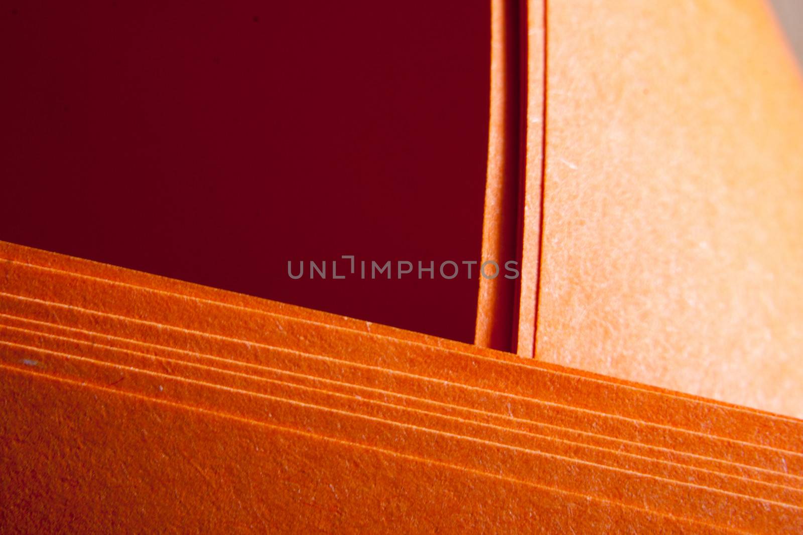 Orange paper textured grunge paper folds