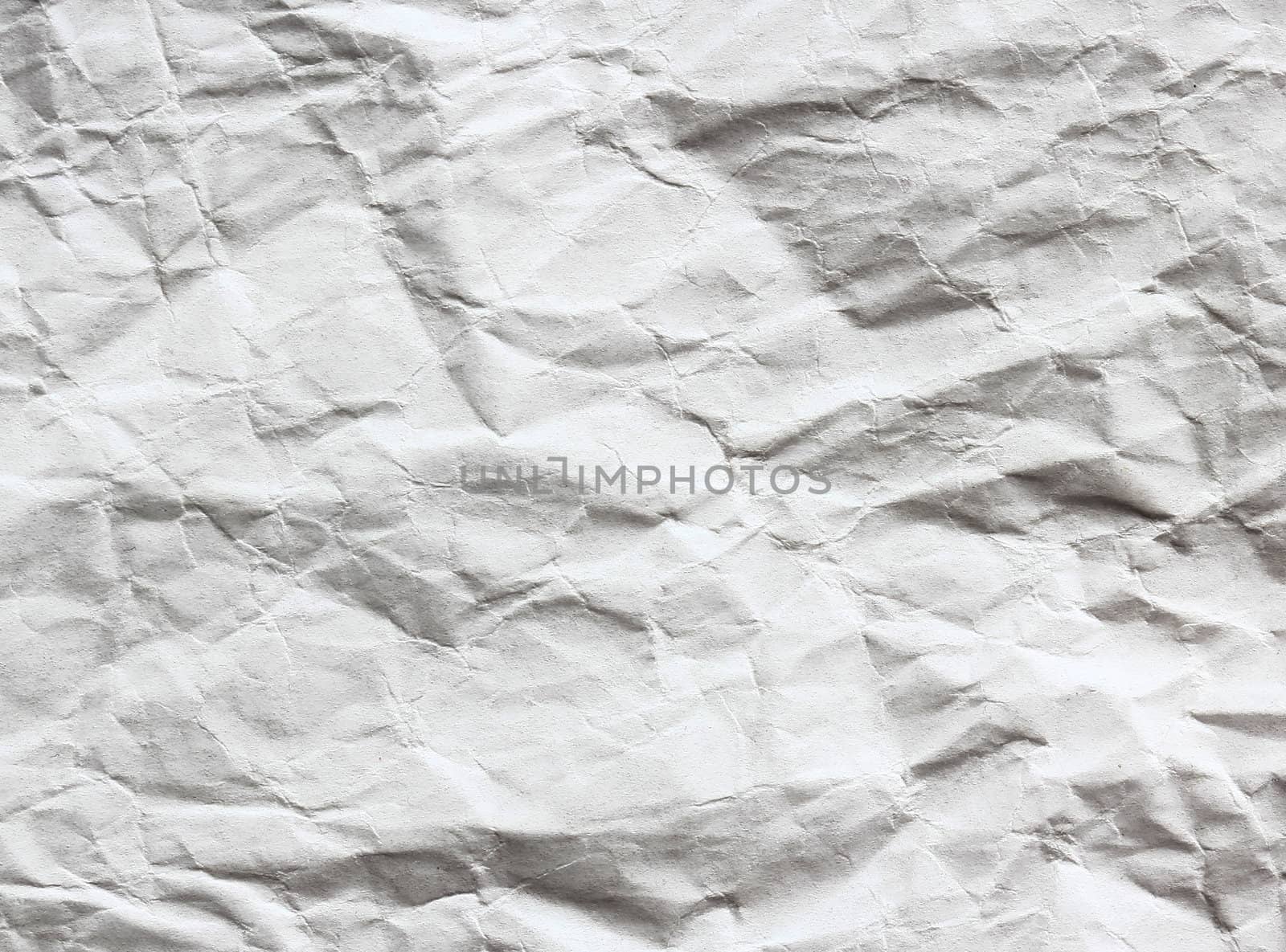 Crumpled white sheet. Paper background