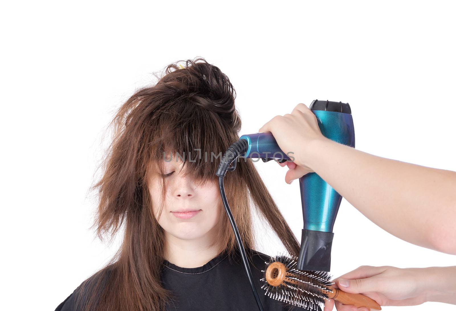Woman enjoying having her hair blow dried by Discovod