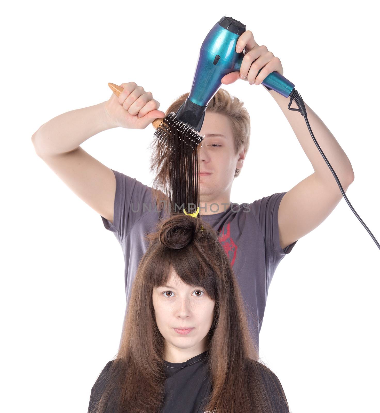 Woman enjoying having her hair blow dried by Discovod