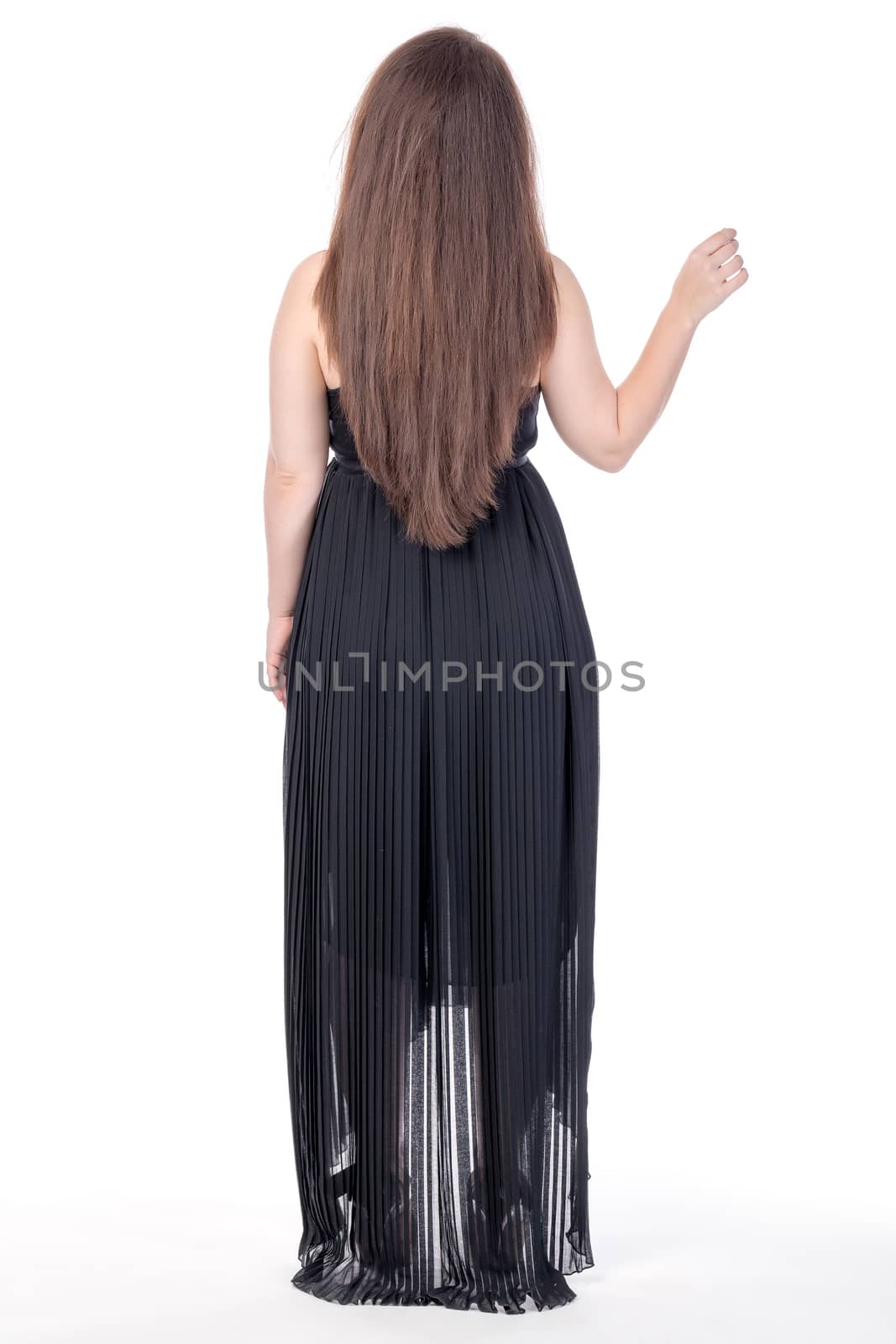 Woman standing her back, on white background