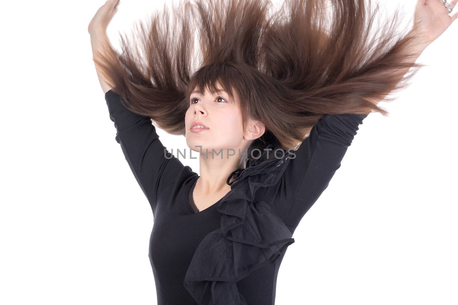 Young woman with her hair flying in the air by Discovod