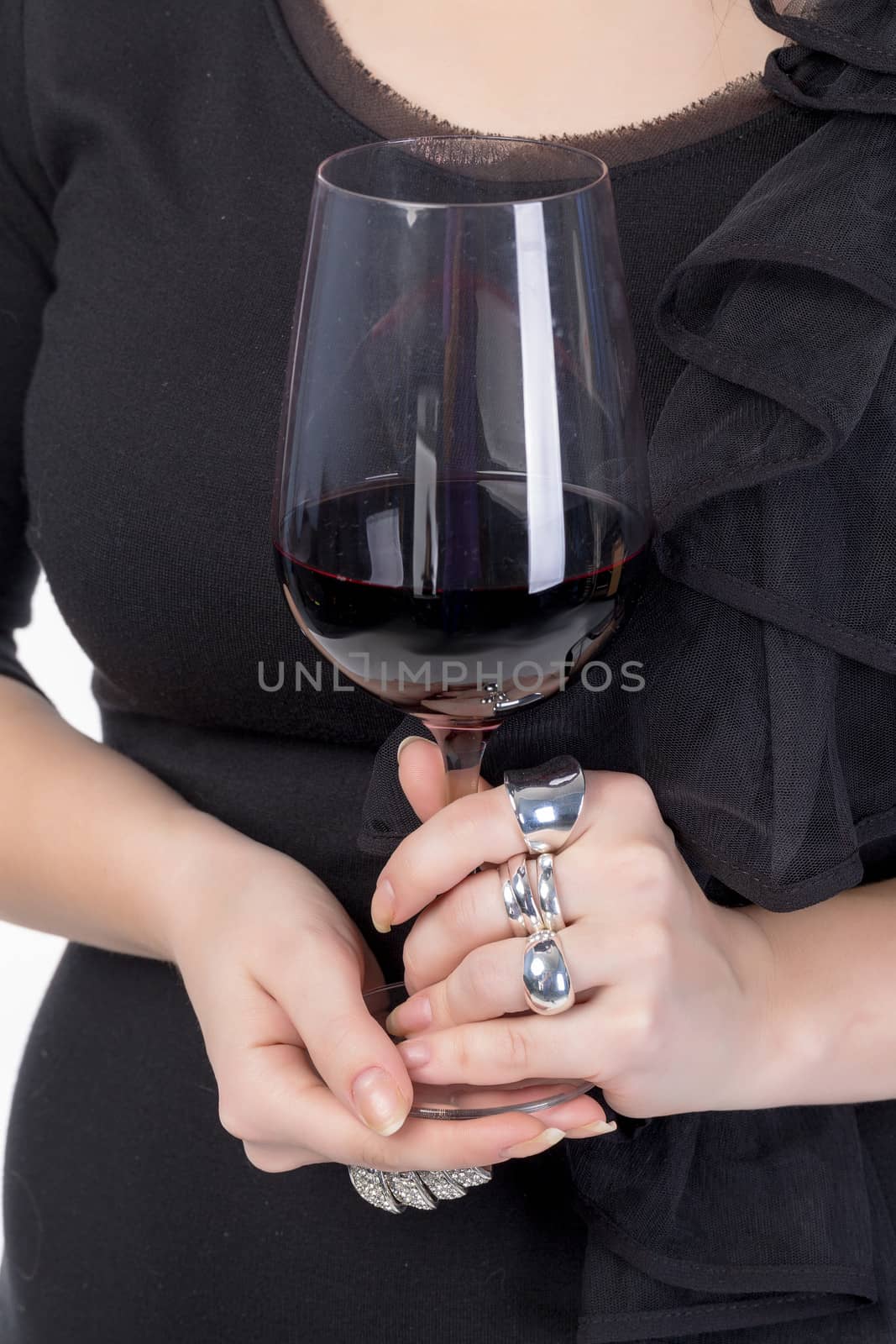 Young woman with red wine from a glass by Discovod