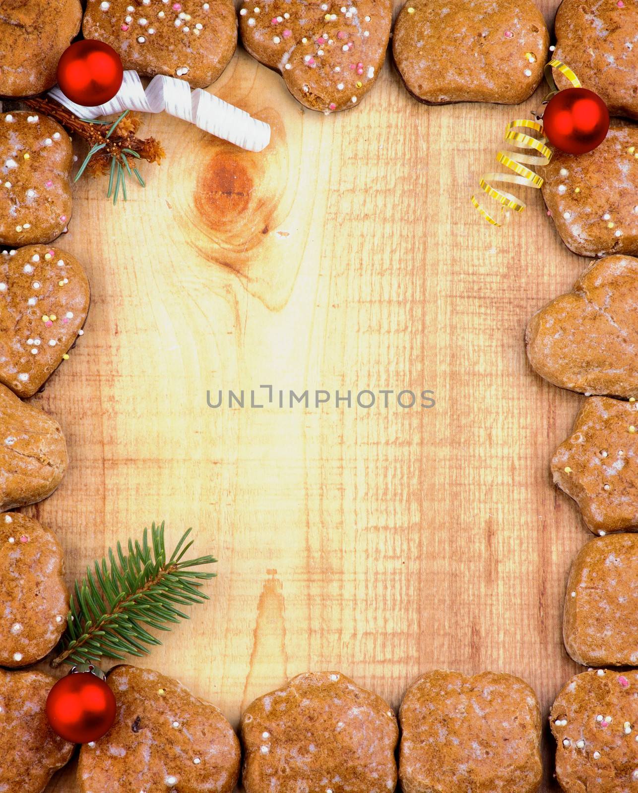 Frame of Tasty Homemade Ginger Cookies with Christmas Decoration closeup on Wooden background