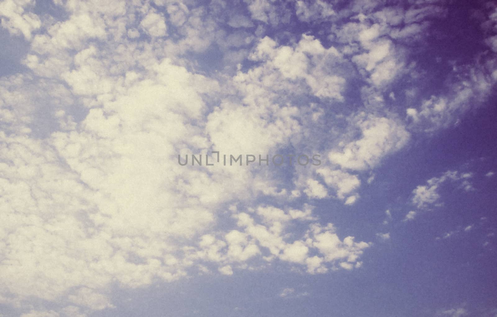 background blue skies, white clouds, grunge textures