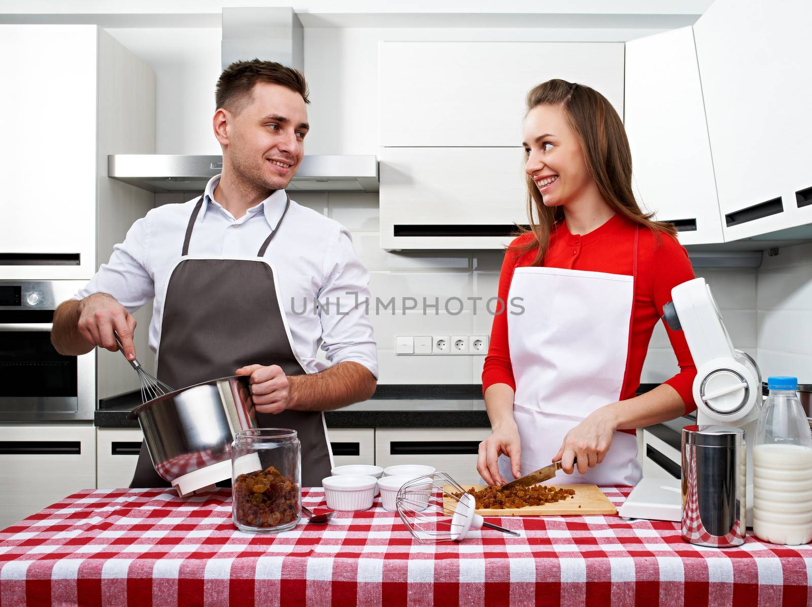 Couple at kitchen by haveseen