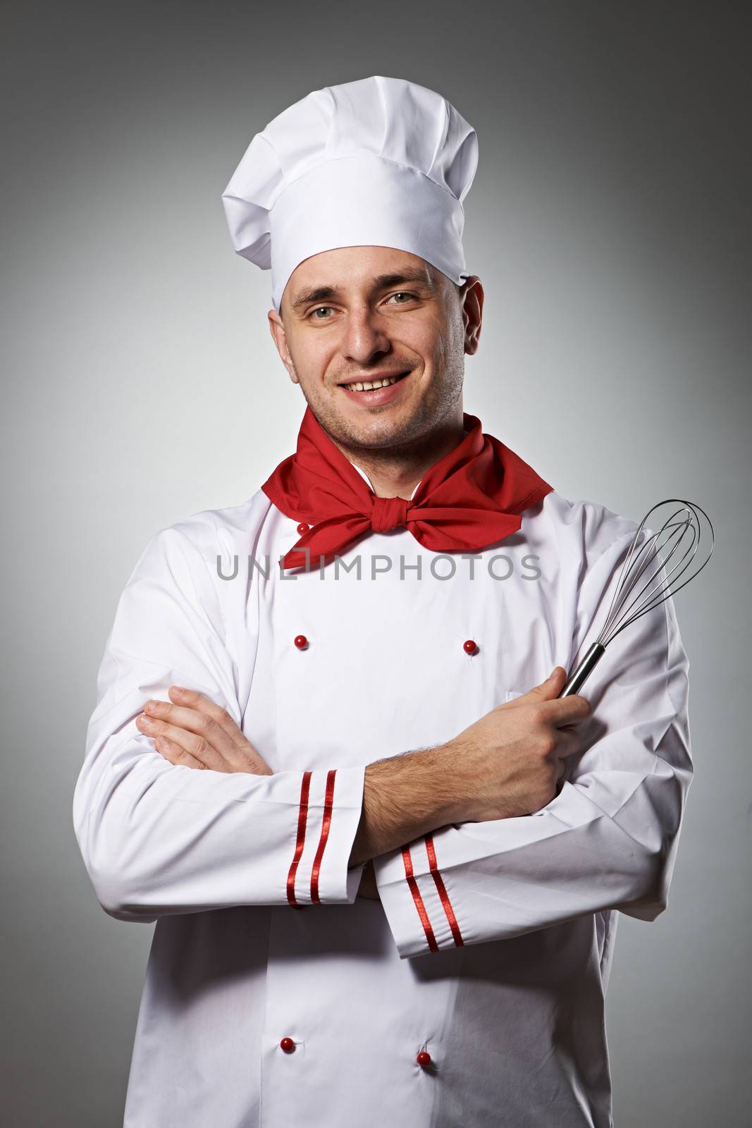 Male chef portrait against grey background