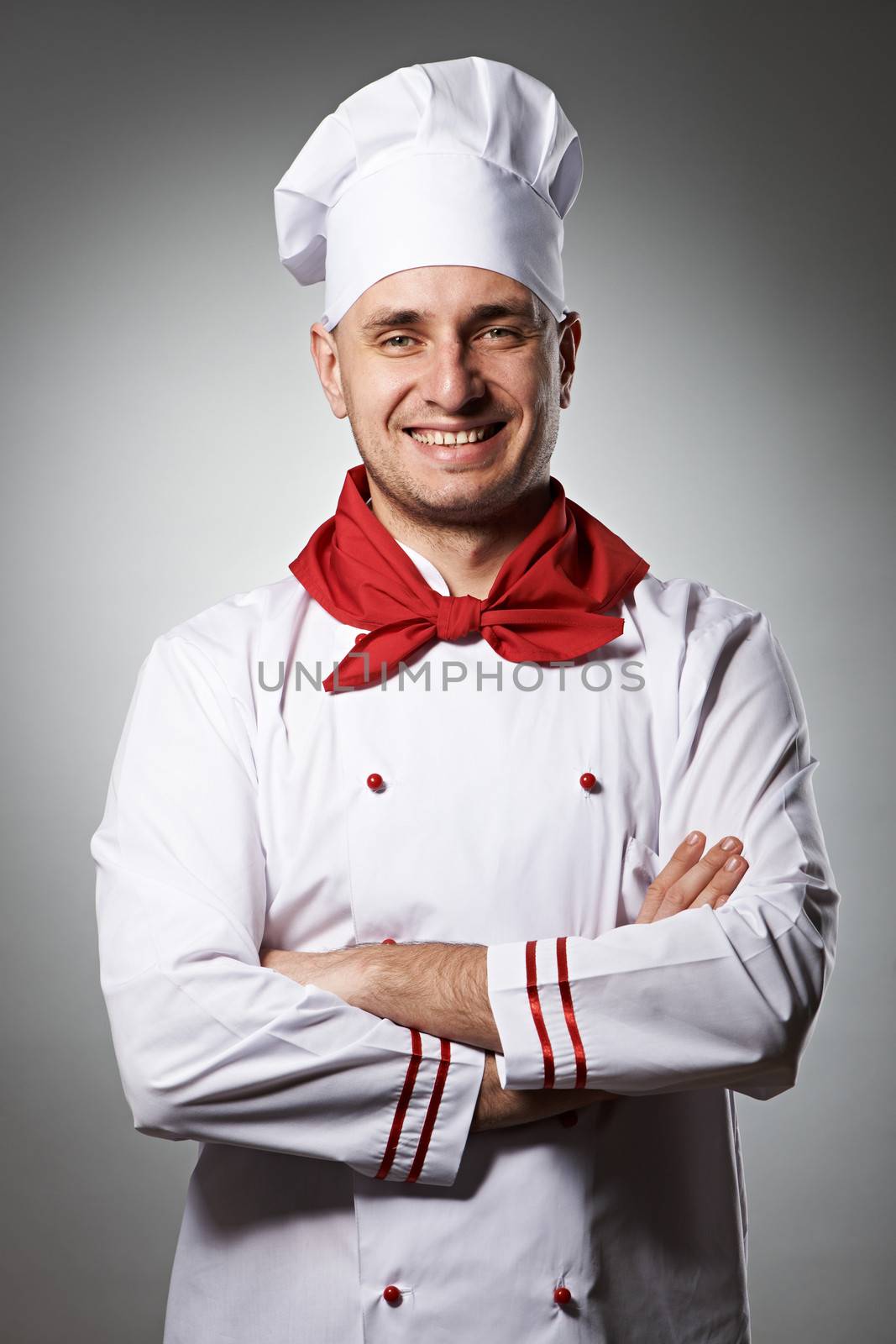 Male chef portrait against grey background