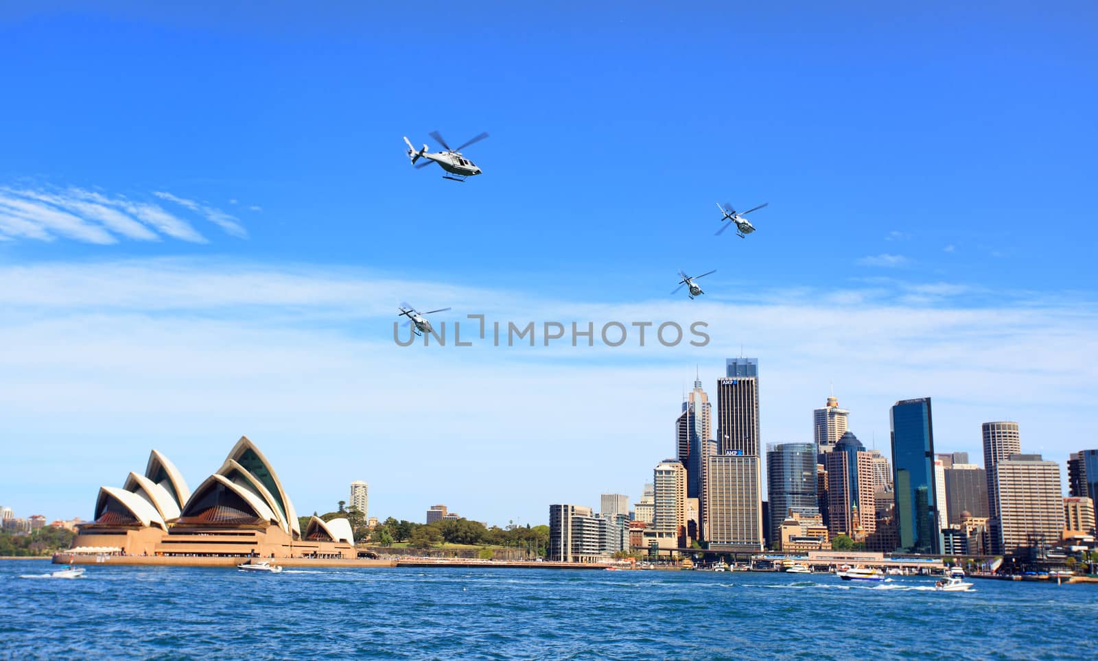 Sydney, Australia - October 6, 2013:  Four Military helicopters fly over Sydney and by the Opera House ib a beautiful spring day.