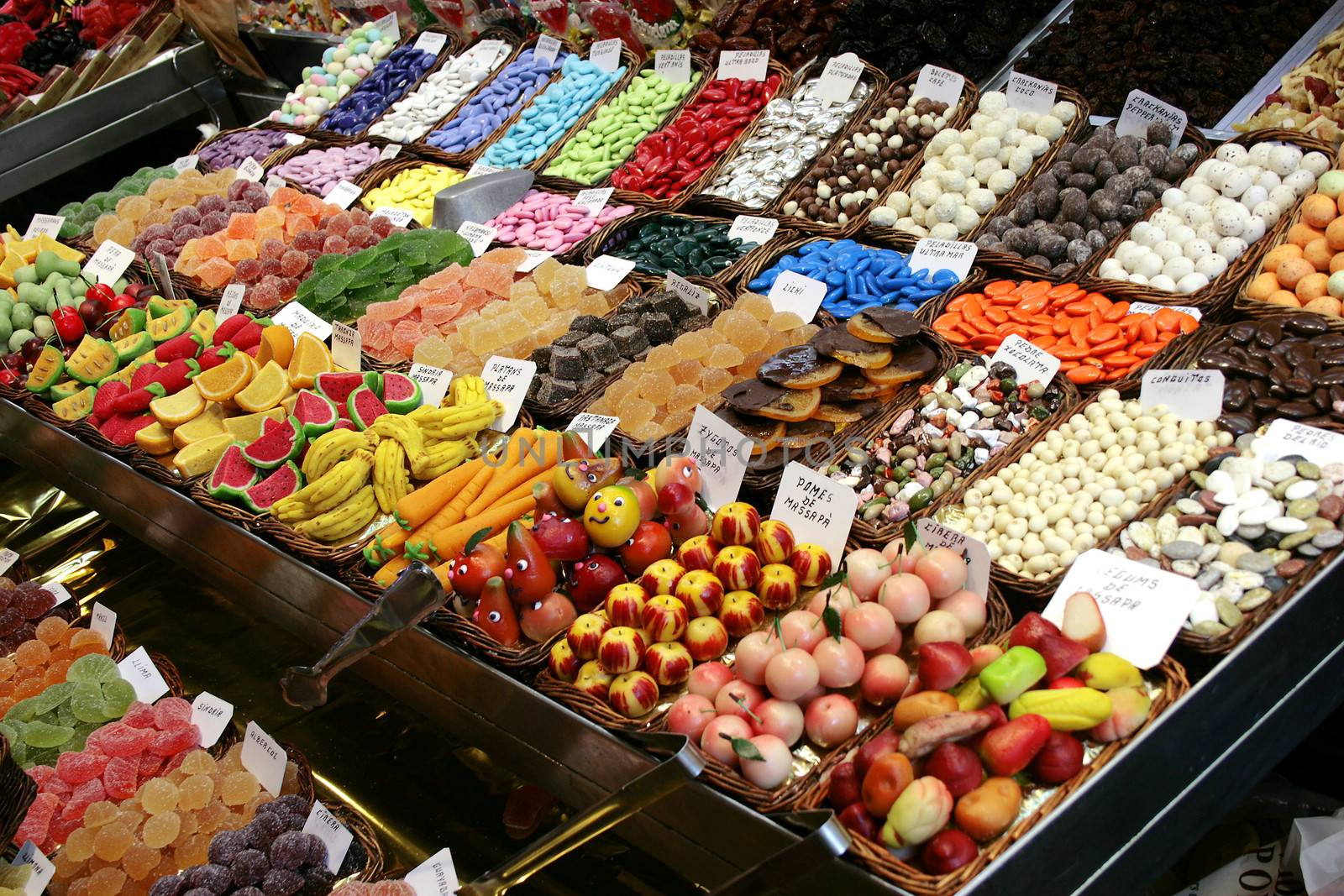 Colorful sweets mix displayed in shop at a market