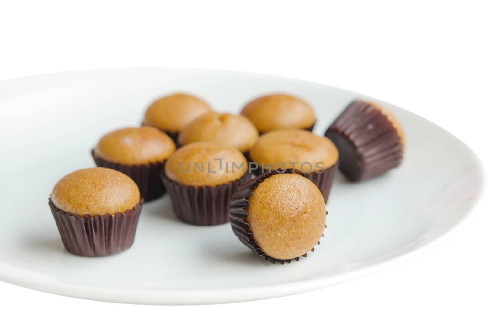 close up  banana muffins , Freshly baked on dish over white background