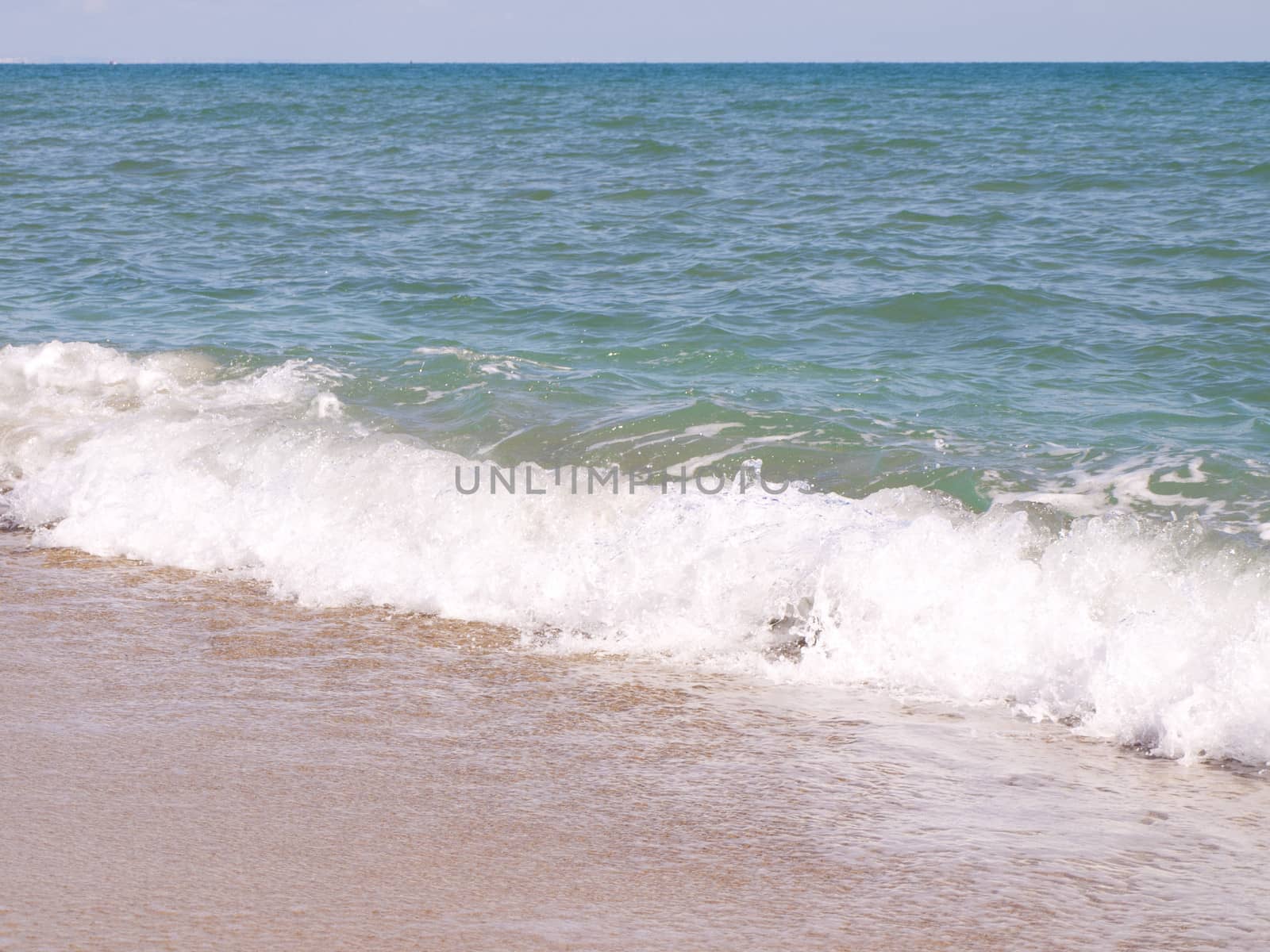 Photo of the Wavy Sea Coast
