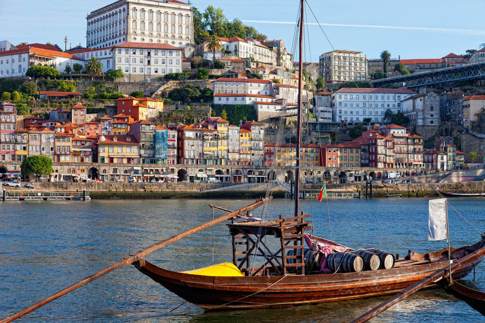 old Porto and traditional boats with wine barrels, Portugal by elena_shchipkova