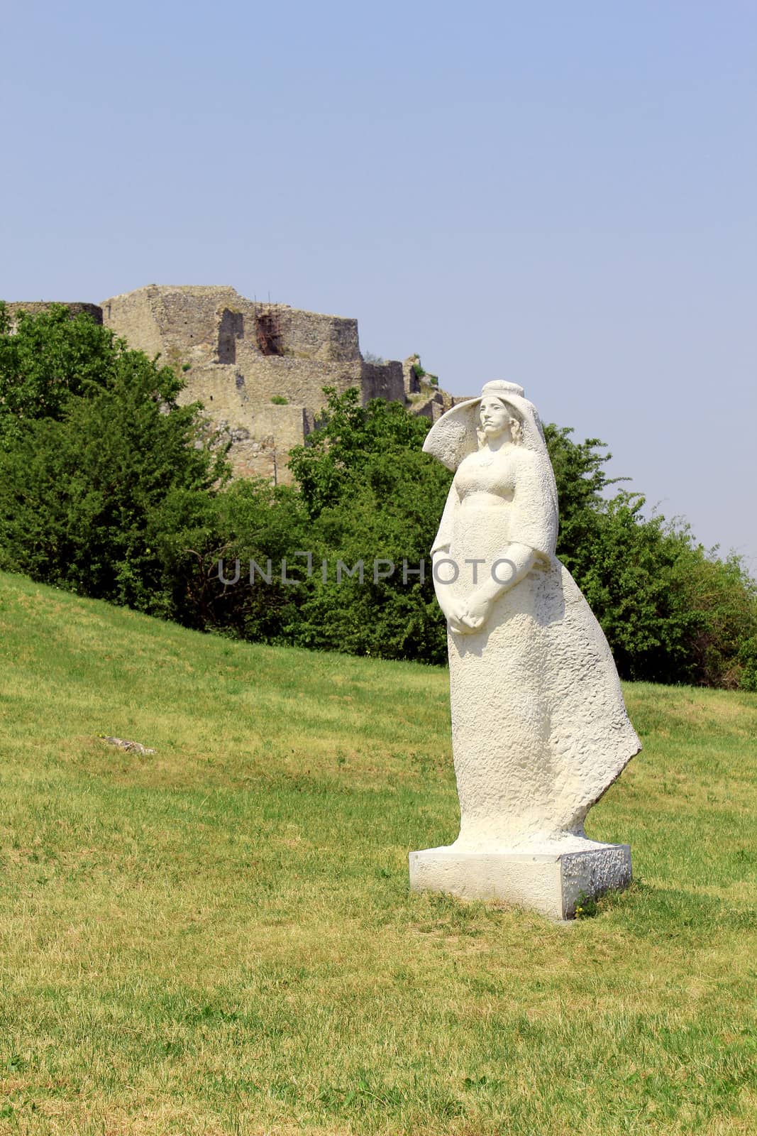 Devin castle near Bratislava (at the border with Austria), white woman sculpture part of the castle art in foreground