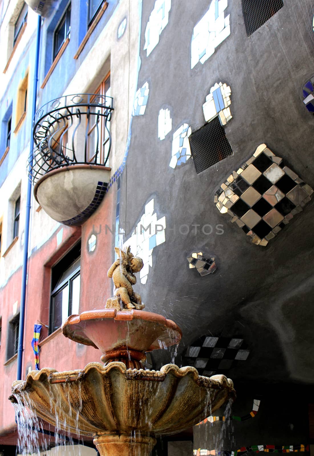 Fountain detail outside Hundertwasser house in Vienna (Famous landmark), Austria 