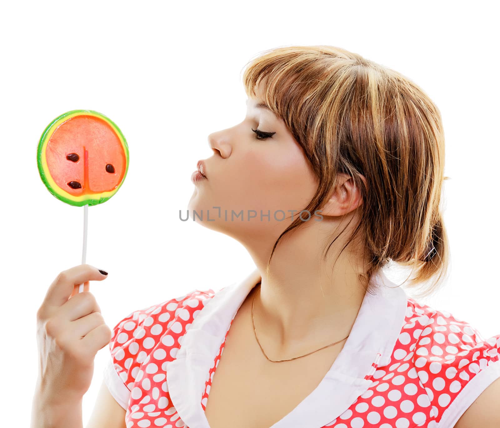 attractive girl with a round lollipop on a white background