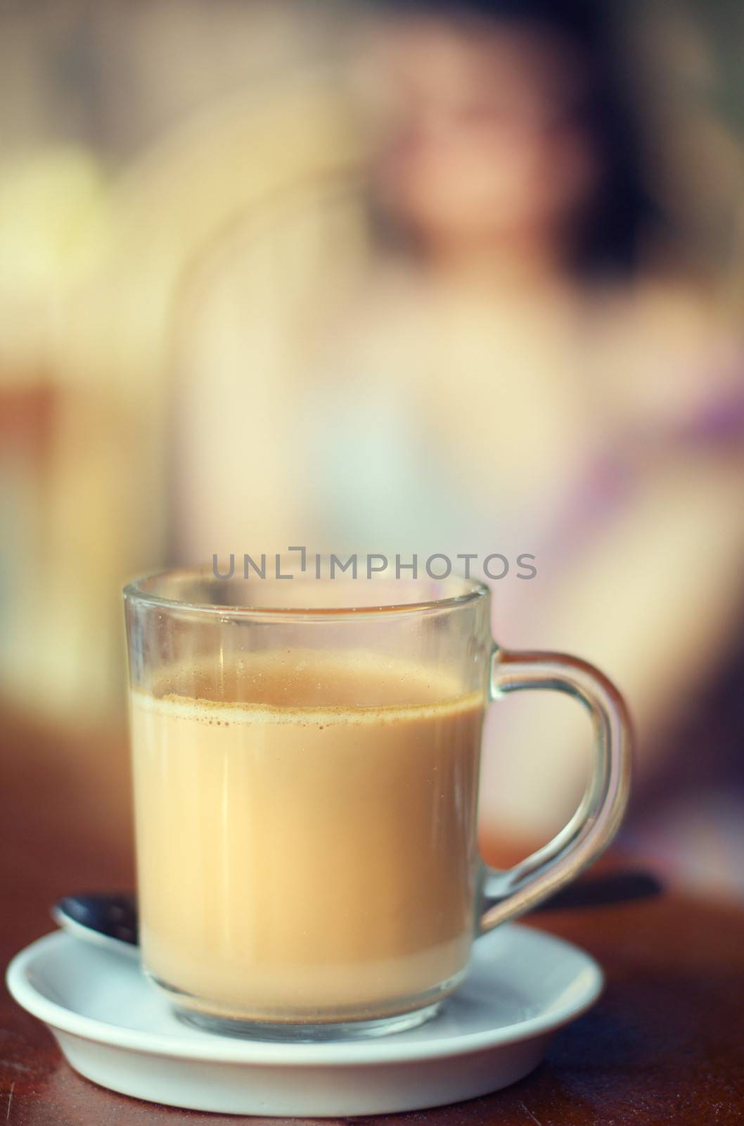 Close-up photo of the cup of milk tea or coffee. Shallow depth of field for natural view