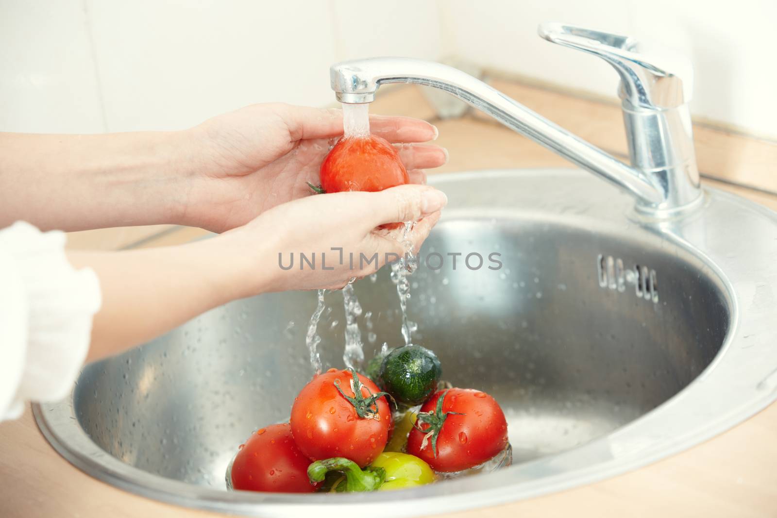 Washing vegetables by Novic