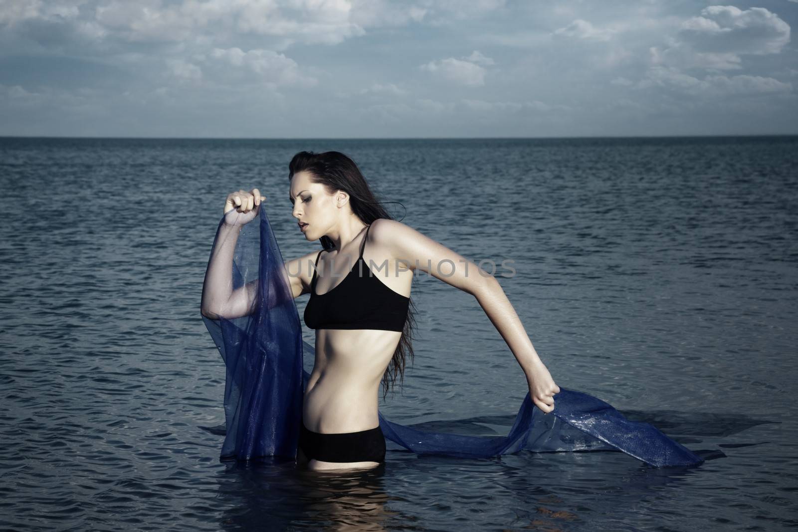 Dramatic photo of the woman in the water