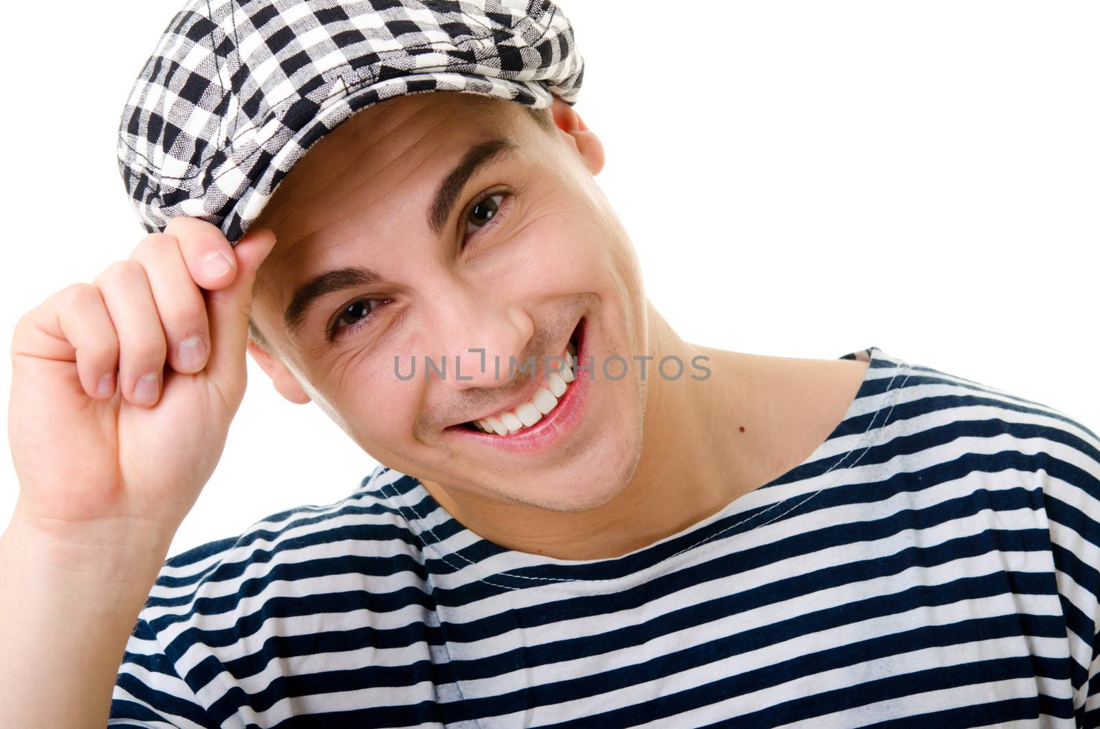 Handsome young man portrait in stylish striped dress and cap