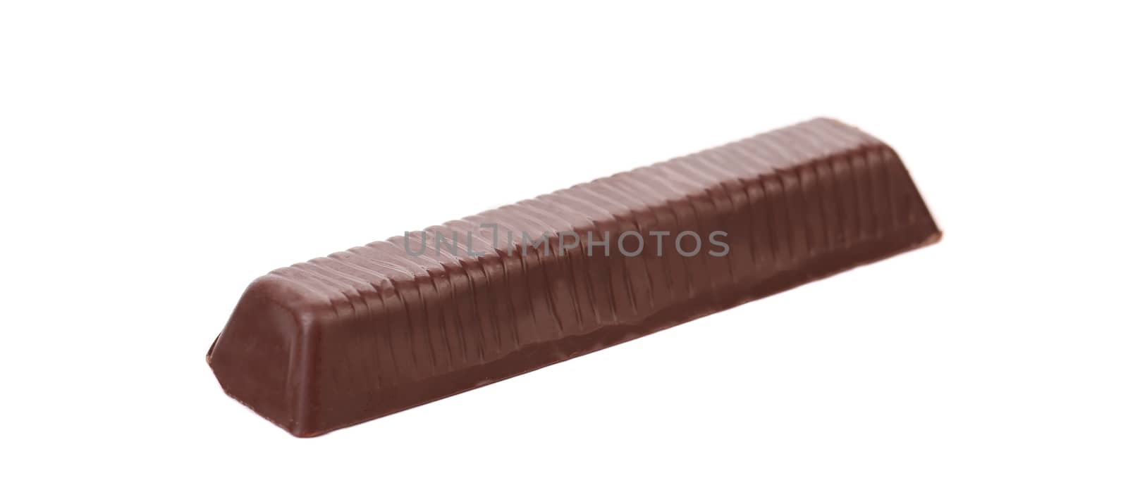 Black chocolate bar with filling. Isolated on a white background.