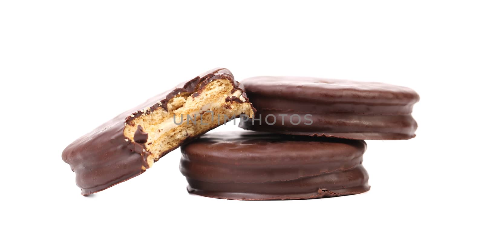 Bitten biscuit sandwich with chocolate. Isolated on a white background.