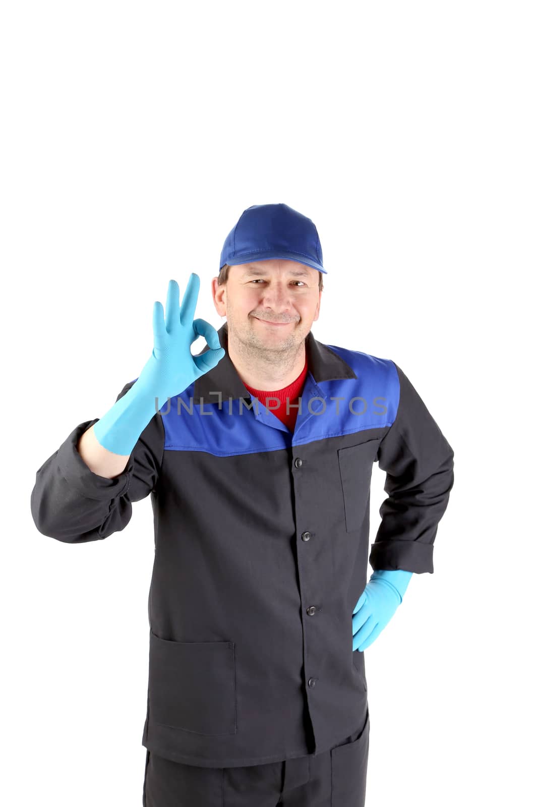 Worker with sign okey. Isolated on a white background.