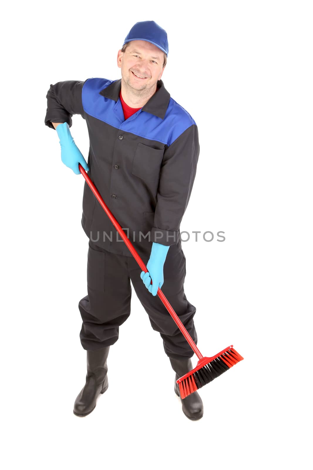 Man with cleaning broom. Isolated on a white background.