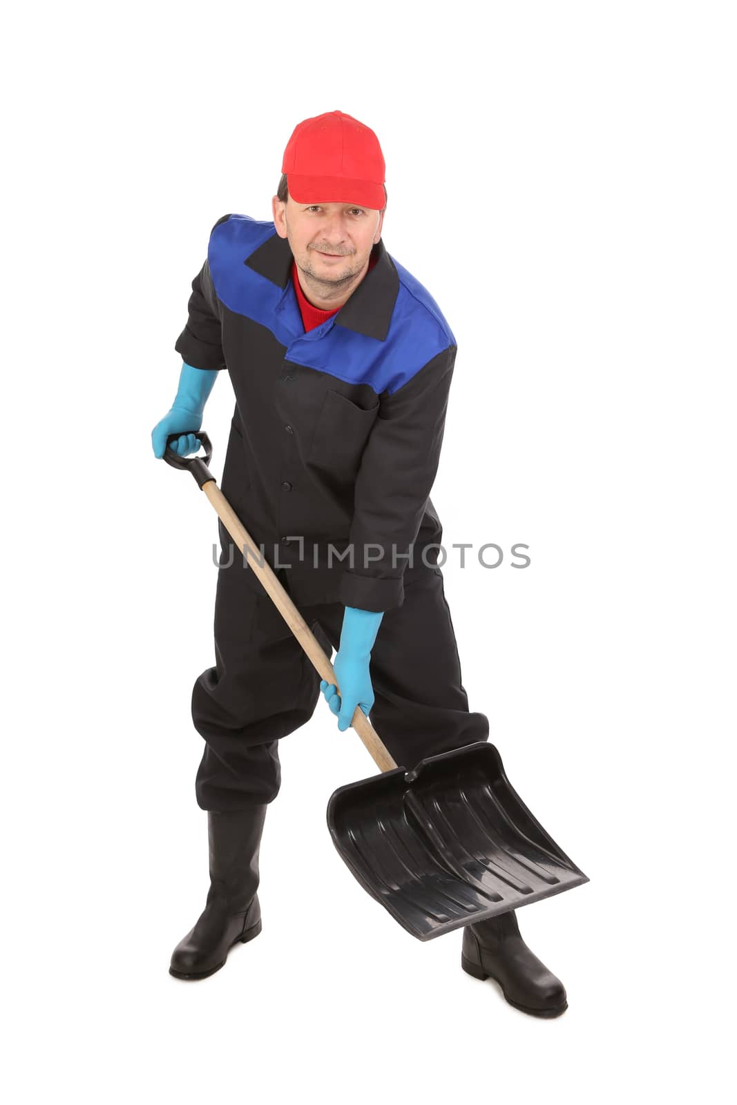 Man holds black shovel. Isolated on a white background.