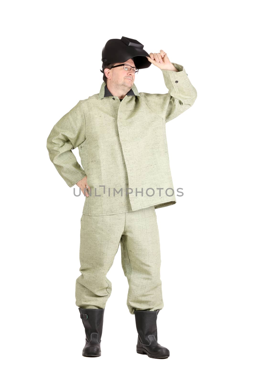 Confident welder holding mask. Isolated on a white background.