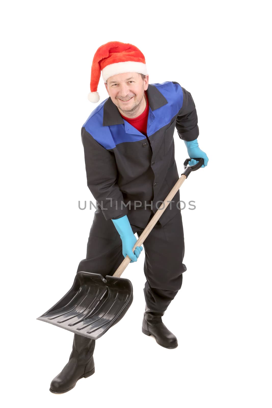 Worker in santa hat with shovel. by indigolotos
