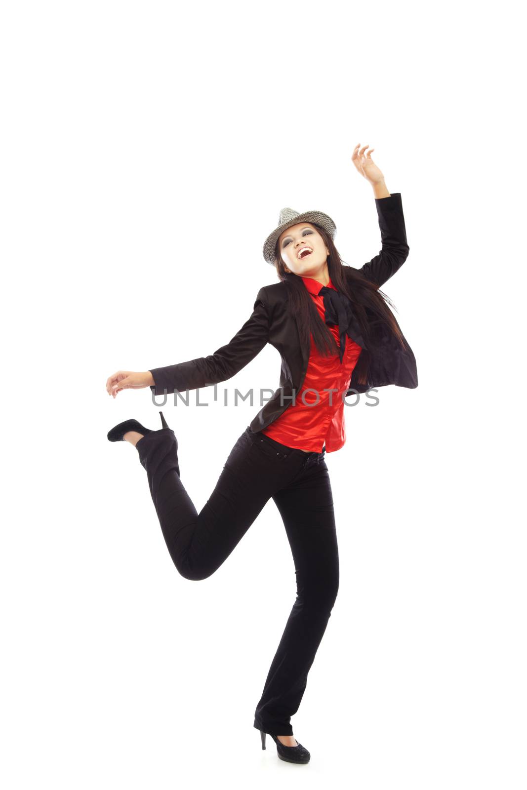 Elegant lady in the black costume jumping on a white background