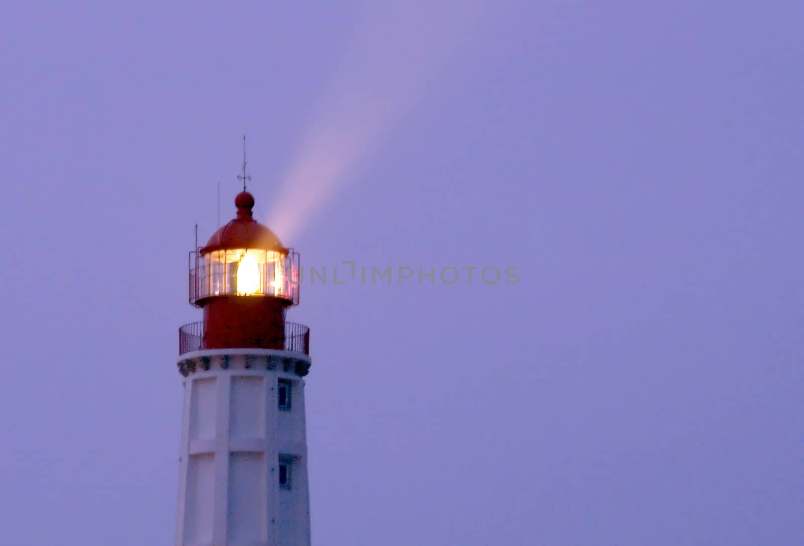 Lighthouse in "Farol" island, in Ria Formosa, natural conservation region in Algarve, Portugal. 