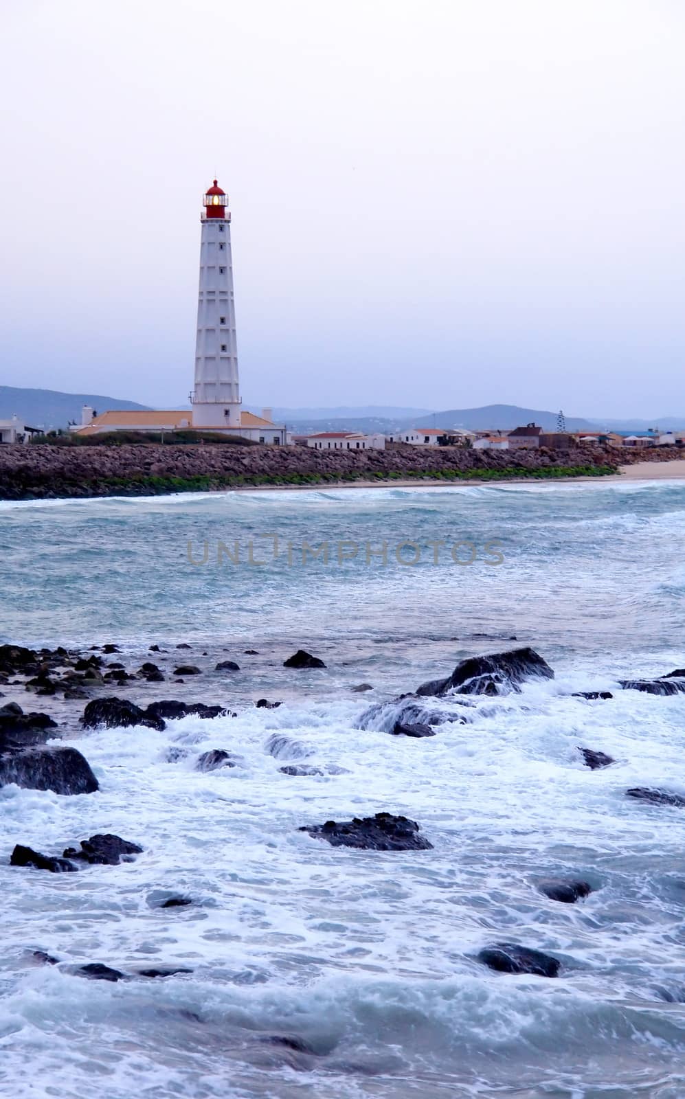 Lighthouse in "Farol" island, in Ria Formosa, natural conservation region in Algarve, Portugal.