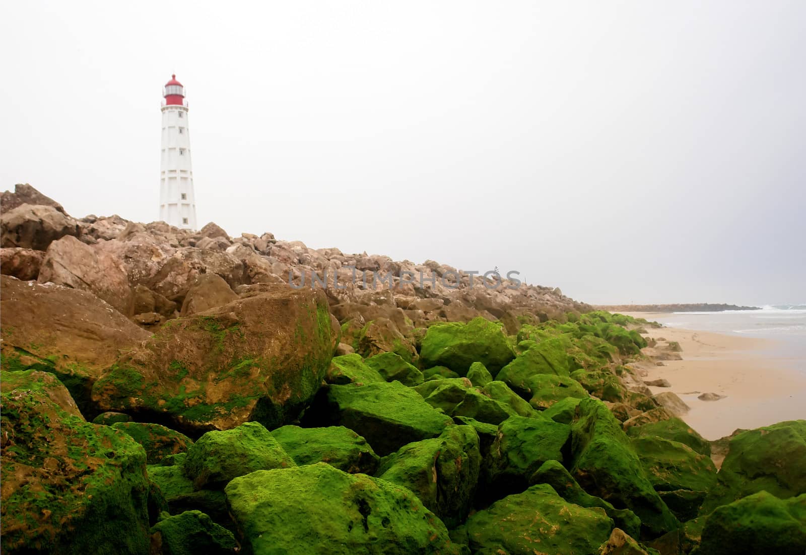 Lighthouse in "Farol" island, in Ria Formosa, natural conservation region in Algarve, Portugal. 
