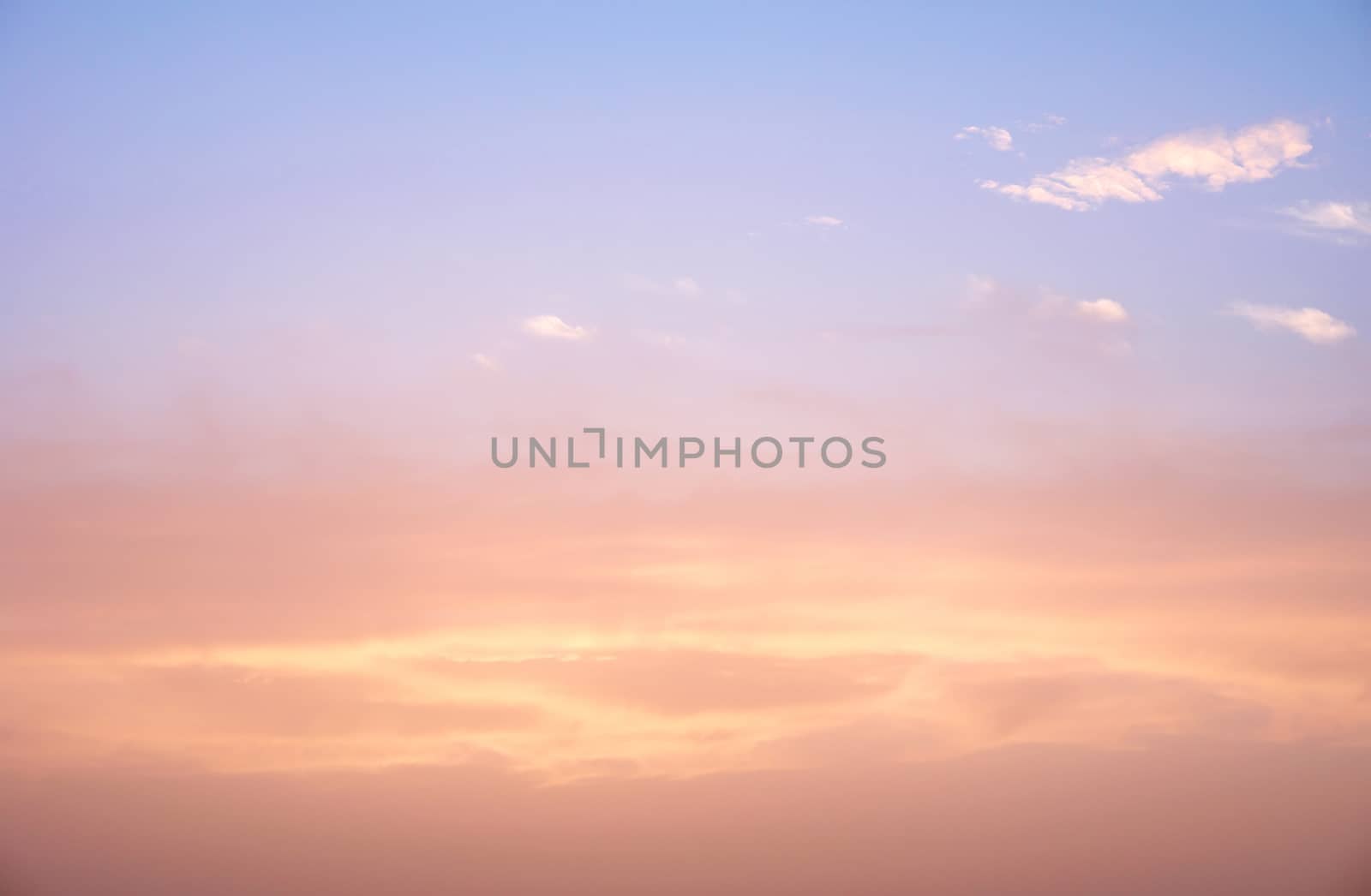 sunlight rays and clouds on the blue sky background