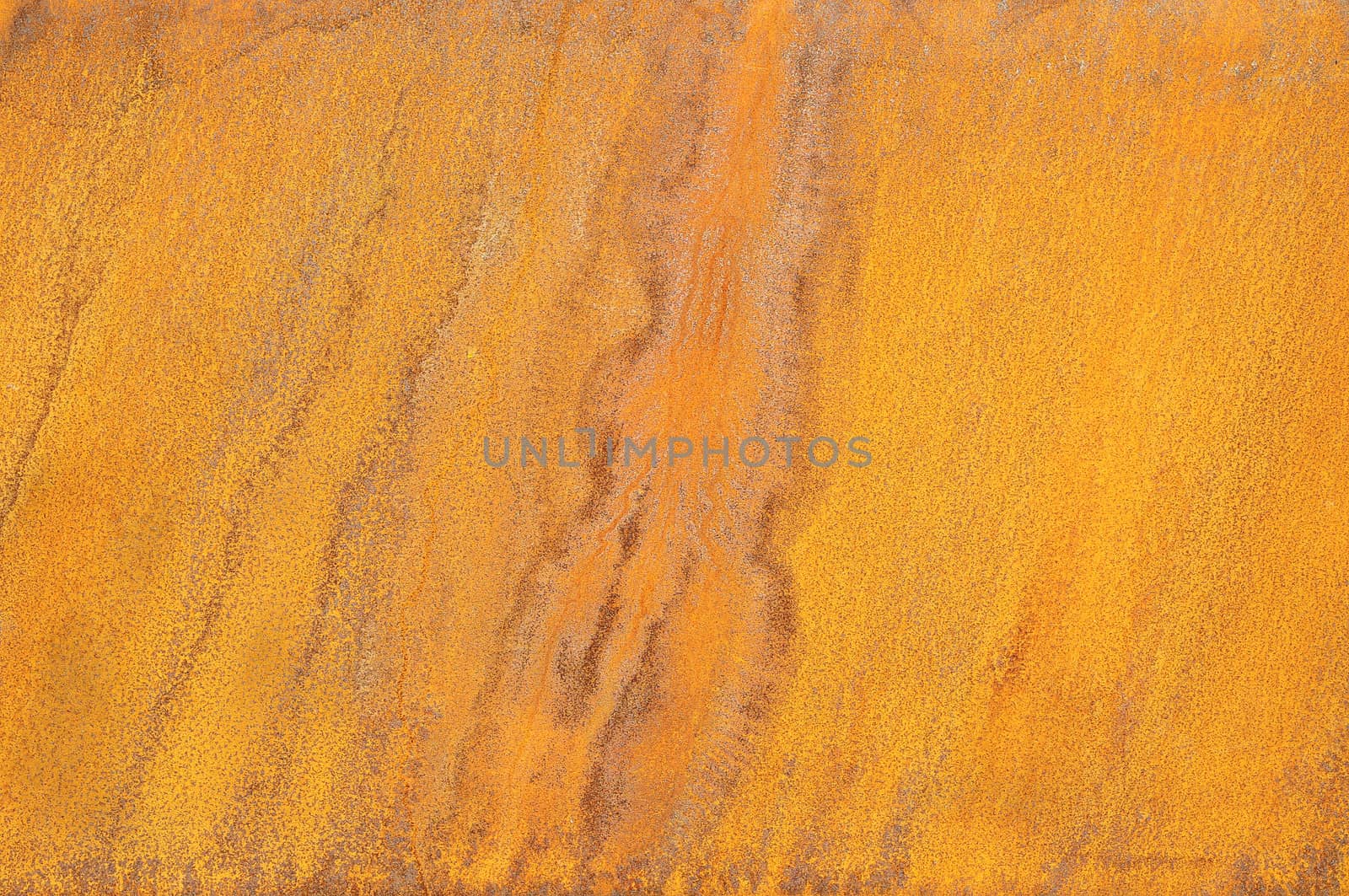 Orange Patterns on the Rusty Surface of the Metal