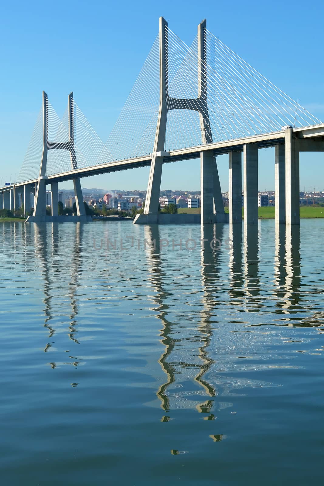 View from river Tagus of Lisbon's "Vasco da Gama" Bridge, Portugal                           