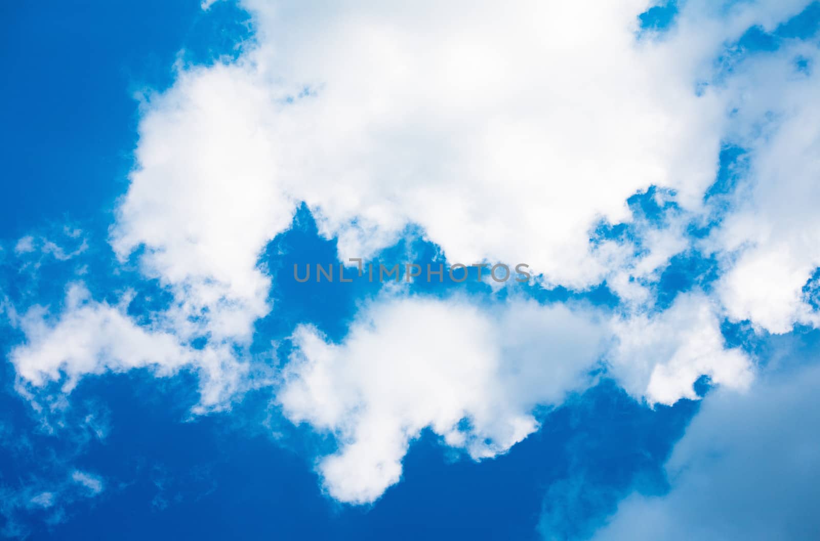 Blue sky with white cloud closeup