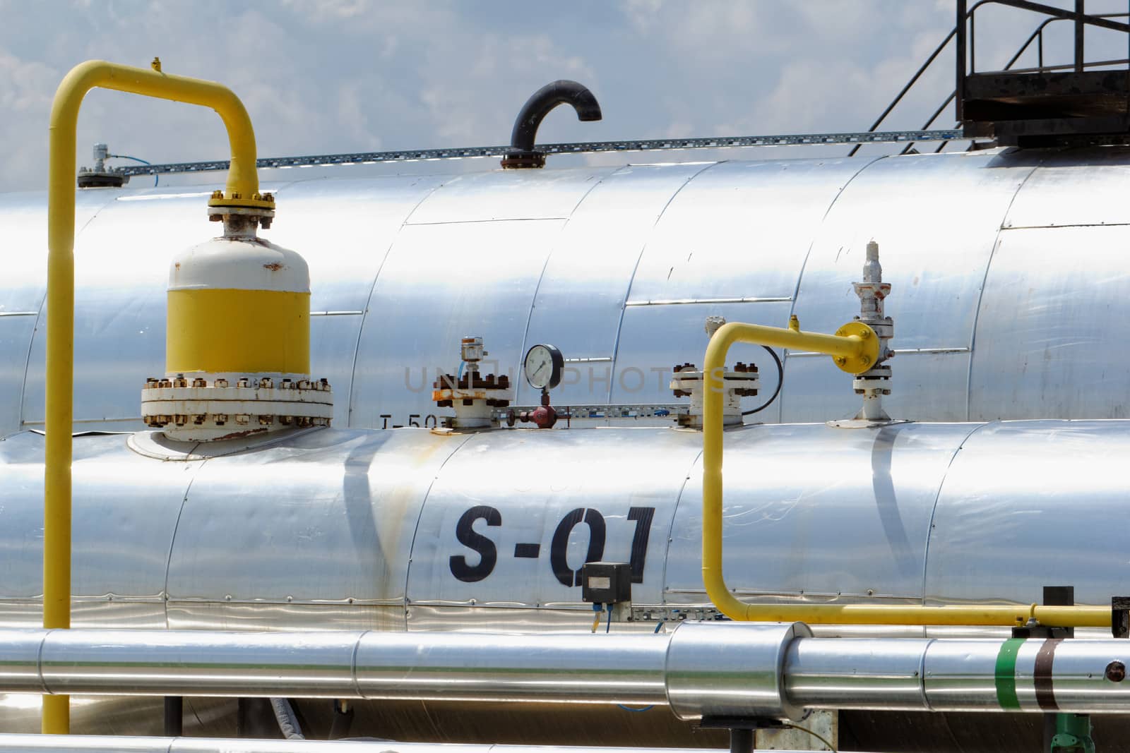 industrial pipes at an oil well