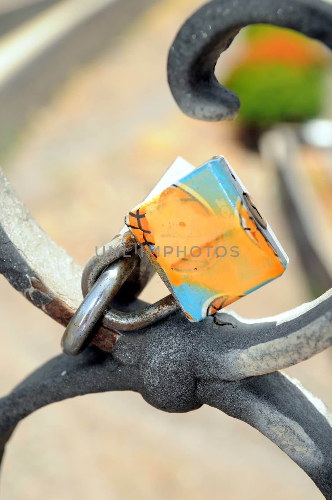 A Colored Metal Lover's Lock on a Bridge